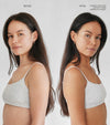 Side-by-side images show a woman with long dark hair in a gray top, labeled Before and After. In the After photo, she is makeup-free after using The Holiday Face Set in Medium 13 Dark Tanning Water; her skin appears smoother.