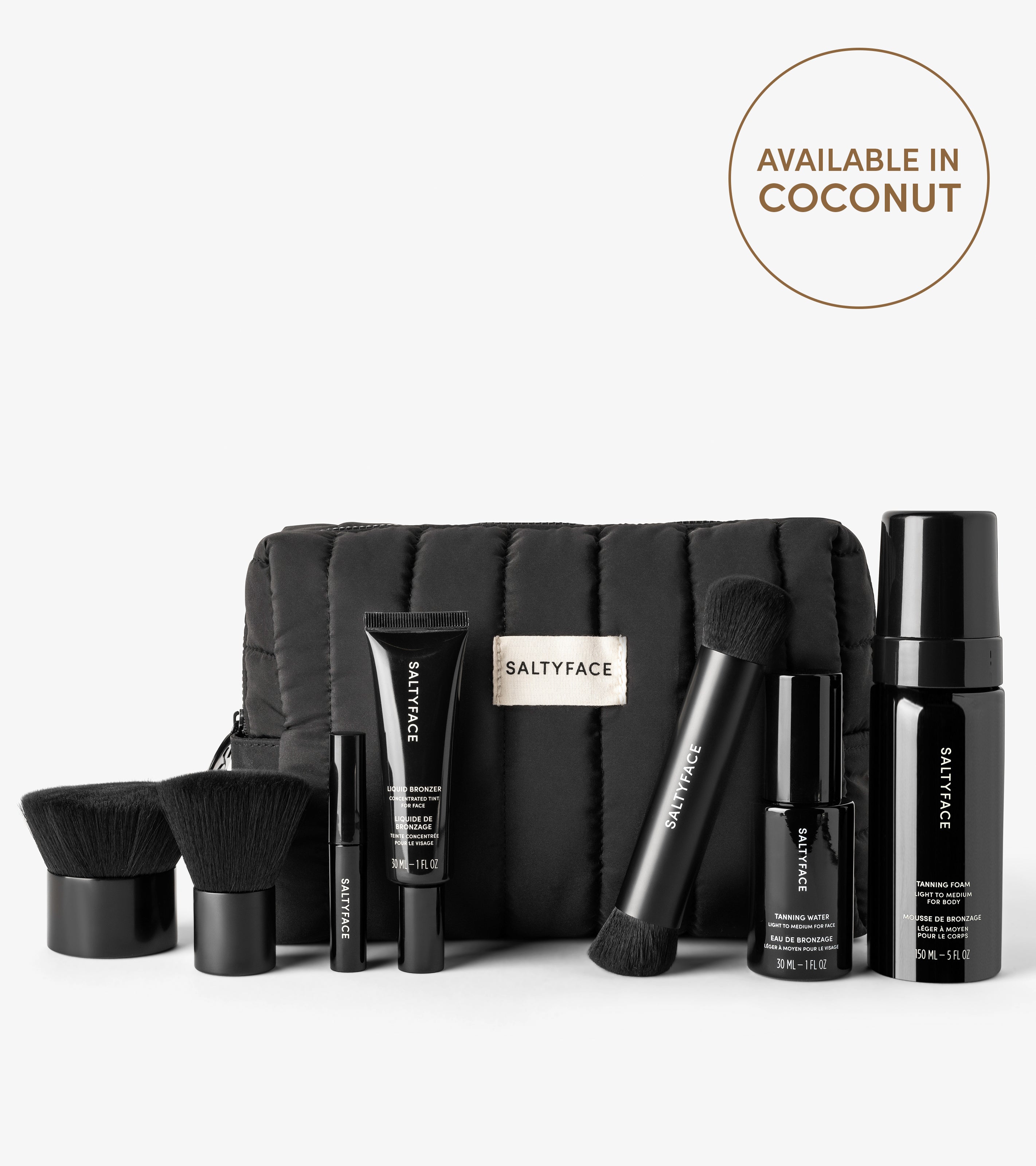 The Saltyface Set features black skincare and makeup products, brushes, and a quilted pouch. A circle label says Available in Coconut. These viral best-sellers are neatly arranged for the perfect natural sun-kissed look.