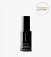A black bottle labeled Tanning Water, Light to Medium for Face, 30 ml stands upright on a white background. Achieve an award-winning sun-kissed tan. A nearby circle reads: Available in Coconut.